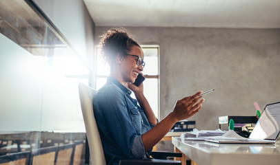 Businesswoman in conversation over phone