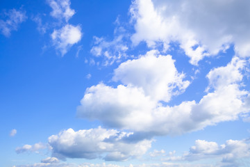 Naklejka na ściany i meble typical beautiful blue sky clouds background