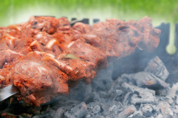 Meat is fried on the grill