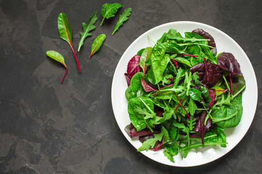 Healthy salad, leaves mix salad (mix micro greens, juicy snack). food background - Image