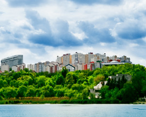 Beautiful view of the city from the city park from the lake