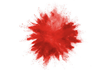 Freeze motion of colorful red powder exploding on white background.  Paint Holi.