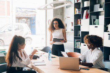 Young businesswomen having meeting in a modern office