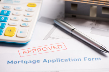 Approved mortgage loan agreement application. Close.