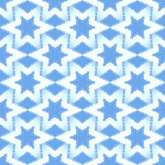 Obraz premium Tile pattern of white stars in blue background ideal for wrapping paper.
