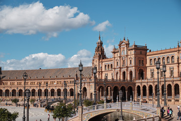 view of Seville's main square Plaza de Espana from arch covered walkway Spain