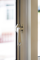 white window handle and latch