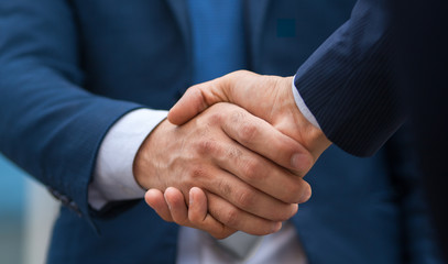 Two business people shaking hands, businessman, hand