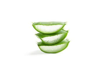 Stack of aloe vera slices isolated on white background. Herbal medicine