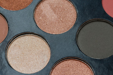 Colorful eye shadows palette. Colorful make-up palette background.