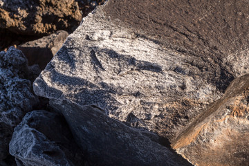Lava stones with ice cover in the morning