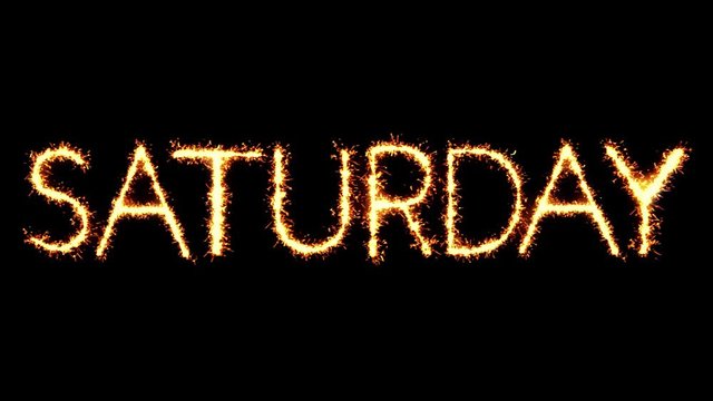 Saturday Text Sparkler Writing With Glitter Sparks Particles Firework on Black 4K Loop Background. Greeting card, Invitation, Celebration, Party, Gift, Message, Wishes, Festival.