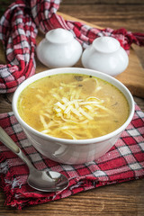 Broth - chicken soup in a bowl.
