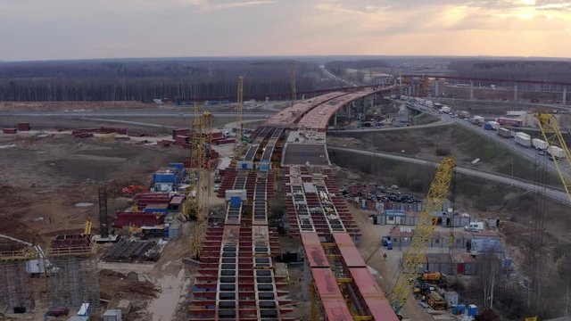 Construction of an overpass bridge over the highway. Aerial shot. central ring car road. ZKAD.