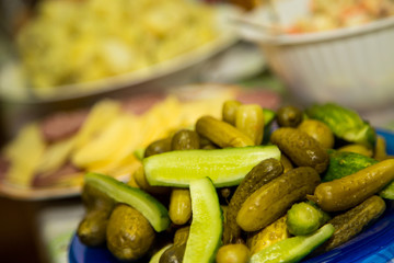Canned pickles on a plate. Traditional Russian snack