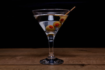  Martini cocktail on wooden table 
