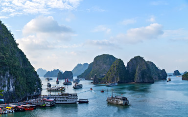 Fototapeta na wymiar Cruise archipelago top view wooden junk sailing Ha Long Bay, Vietnam UNESCO World Heritage Site.