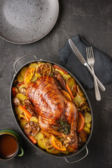 Christmas Duck Baked with Potatoes, Carrots and Oranges. Festive Food Concept.