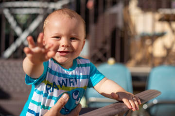 little baby portrait in summer time during sunset