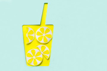 Blue background with fresh lemonade of paper, concept, summer, decor for postcard, top view, handmade