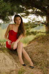 young woman in red dress nature fresh air