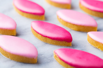 Calissons, traditional French Provence sweets on marble table background.