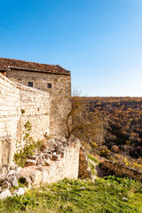 Fototapeta premium Old stone houses of Medieval cave city-fortress Chufut-Kale in the mountains, Bakhchisaray, Crimea