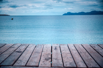 Fototapeta premium Wooden pier in cloudy morning. Rest, silent, Melancholy concept photo