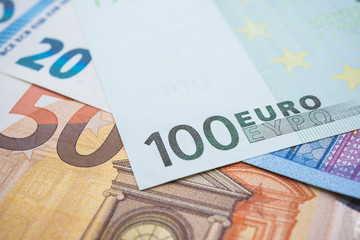 Macro shot focus on price on money cash euro banknote background. The currency of the euro country area and institutions. Europe and world financial economic investment, forex, Brexit effect concept.