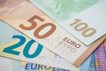 Macro shot focus on price on money cash euro banknote background. The currency of the euro country area and institutions. Europe and world financial economic investment, forex, Brexit effect concept.