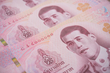 Close up King Maha Vajiralongkorn Bodindradebayavarangkun (Rama 10) on 100 baht Thai banknotes bill texture background. Concept of Thai baht payment currency of Thailand, Forex investment.