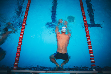 Underwater Young Boy in the Swimming Pool. Summer Vacation Fun