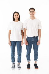 Fototapeta premium Full length of a young casual wear couple standing