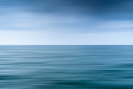Long exposure shot of clouds over the sea
