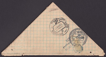 Soldier triangle,a letter from the front.Old postal envelope.Postmark Yoshkar-Ola,Tula and viewed by the military censor, USSR circa 1945