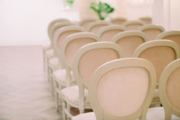 blurred background of row of beautiful chairs on a holiday