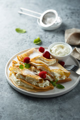 Crepes stuffed with cottage cheese cream