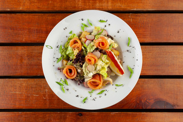 Fresh salad with seafood and herbs