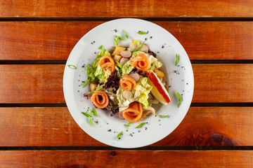 Fresh salad with seafood and herbs