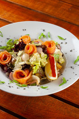 Ketogenic diet salad with greens and torut