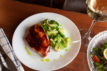 Your healthy protein meal: chicken breast with asian dressing and steamed broccoli