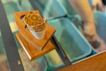 empty ice cream cone on counter top space for summer concept