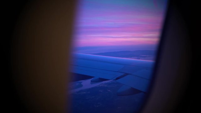 View of Comporta, troia, Setubal bay, near Lisbon, Portugal. Aerial perspective from a plane window. Soft sunset lights with pink, pinkish tone/hue.