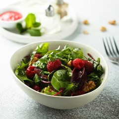 Prosciutto salad with walnuts and fresh raspberries