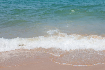 Fototapeta na wymiar waves on the beach in thailand