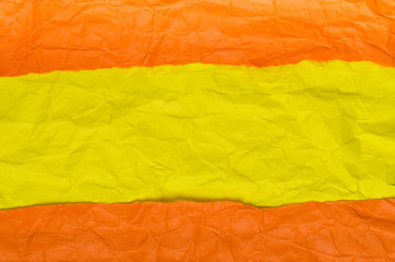 Background of crumpled paper yellow orange horizontal