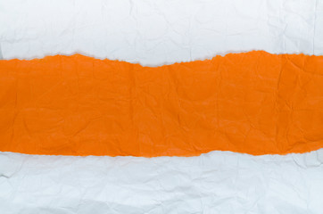 Background of crumpled paper white orange horizontal