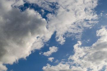 Bright blue cloudscape. Nature picture for background. Cloudy texture.