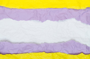 Background of strips of colored crumpled paper