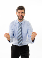 Portrait of young attractive caucasian businessman, arms up celebrating success